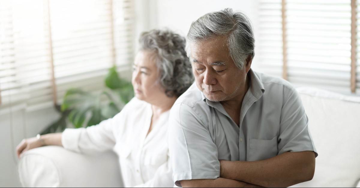 An older couple fighting